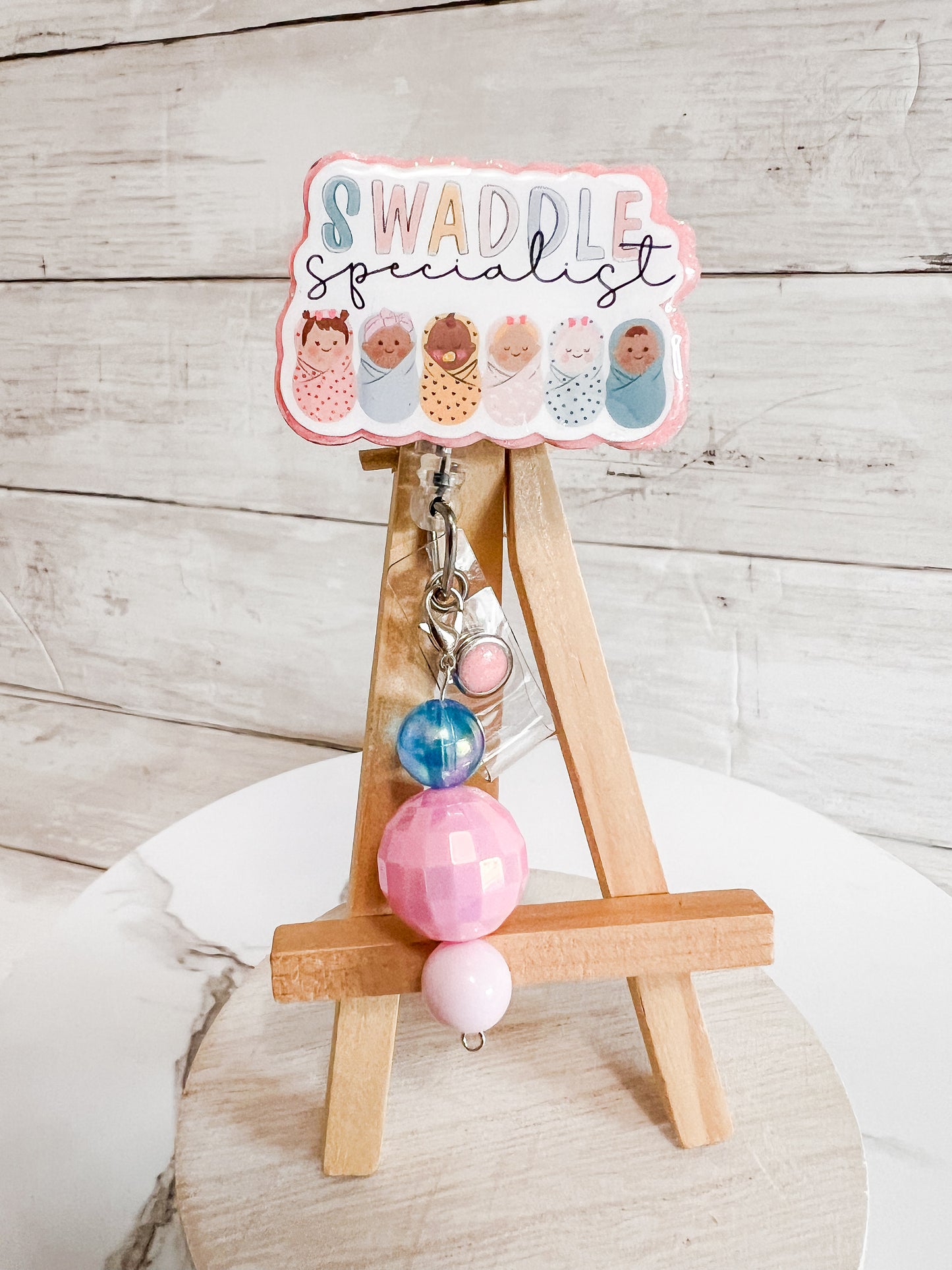 Swaddle Specialist Badge Reel